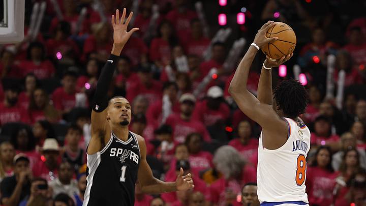 Knicks forward OG Anunoby shoots the ball against Spurs forward Victor Wembanyama in Game 1 of the NBA Finals.