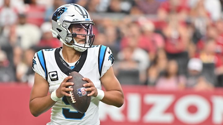 Carolina Panthers quarterback Bryce Young (9) looks to pass during the second quarter against the Arizona Cardinals at State Farm Stadium. 