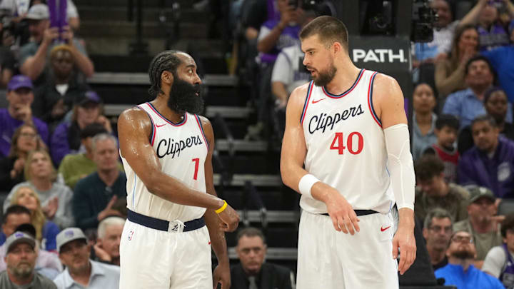 Apr 11, 2025; Sacramento, California, USA; Los Angeles Clippers guard James Harden (1) and center Ivica Zubac (40) talk during the third quarter against the Sacramento Kings at Golden 1 Center. Mandatory Credit: Darren Yamashita-Imagn Images Apr 11, 2025; Sacramento, California, USA; Los Angeles Clippers guard James Harden (1) and center Ivica Zubac (40) talk during the third quarter against the Sacramento Kings at Golden 1 Center. Mandatory Credit: Darren Yamashita-Imagn Images