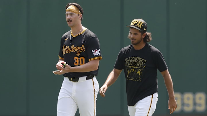 May 26, 2024; Pittsburgh, Pennsylvania, USA; Pittsburgh Pirates pitchers Paul Skenes (left) and Jared Jones (right) walk in the outfield before the game against the Atlanta Braves at PNC Park. Mandatory Credit: Charles LeClaire-Imagn Images May 26, 2024; Pittsburgh, Pennsylvania, USA; Pittsburgh Pirates pitchers Paul Skenes (left) and Jared Jones (right) walk in the outfield before the game against the Atlanta Braves at PNC Park. Mandatory Credit: Charles LeClaire-Imagn Images
