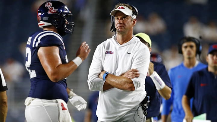 Aug 31, 2024; Oxford, Mississippi, USA; Mississippi Rebels head coach Lane Kiffin looks at the jumbotron during the second half against the Furman Paladins at Vaught-Hemingway Stadium. Mandatory Credit: Petre Thomas-Imagn Images
