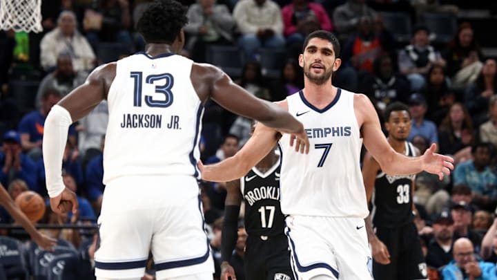 Feb 26, 2024; Memphis, Tennessee, USA; Memphis Grizzlies forward-center Santi Aldama (7) reacts with forward-center Jaren Jackson Jr. (13): Petre Thomas-Imagn Images