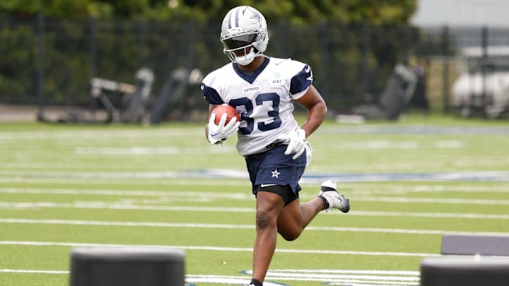 Dallas Cowboys running back Javonte Williams goes through a drill during practice at the Ford Center at the Star Training Facility in Frisco, Texas. Dallas Cowboys running back Javonte Williams goes through a drill during practice at the Ford Center at the Star Training Facility in Frisco, Texas.