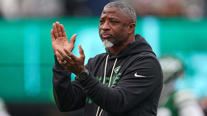 Dec 28, 2025; East Rutherford, New Jersey, USA; New York Jets head coach Aaron Glenn on the field before the game against the New England Patriots at MetLife Stadium.