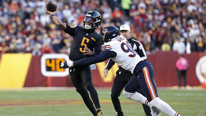 Montez Sweat puts a hit on Jayden Daniels in last year's "Hail Mary" defeat in Washington.