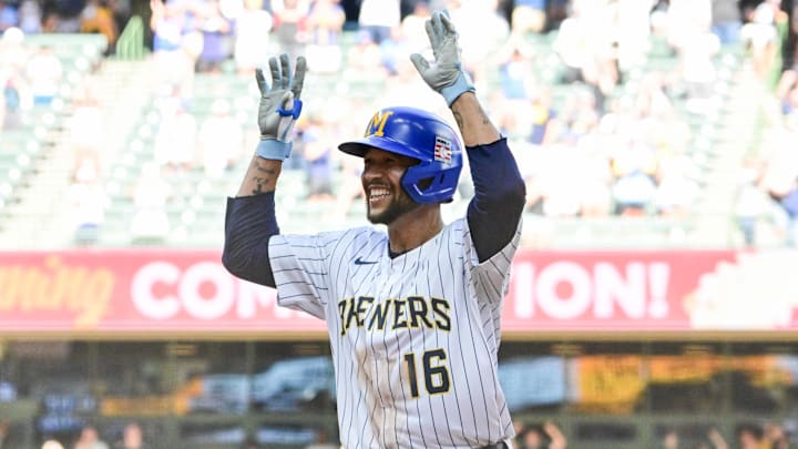 Milwaukee Brewers center fielder Blake Perkins (16) celebrates after driving home the winning run against the Miami Marlins at American Family Field.