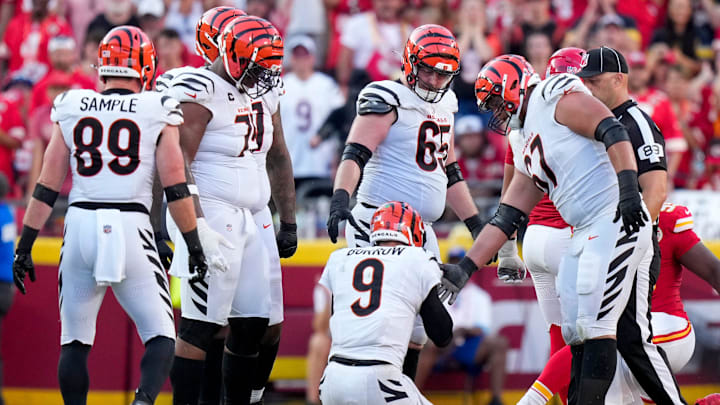Cincinnati Bengals quarterback Joe Burrow (9) is slow to his feet after being sacked in the fourth quarter of the NFL Week 2 game between the Kansas City Chiefs and the Cincinnati Bengals at Arrowhead Stadium in Kansas City on Sunday, Sept. 15, 2024. The Chiefs took a 26-25 win with a go-ahead field goal as time expired.