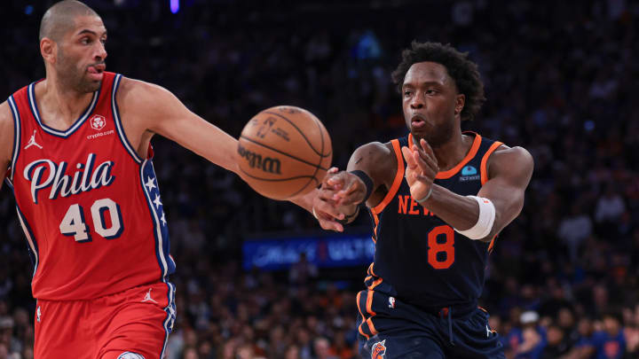 Apr 22, 2024; New York, New York, USA;  New York Knicks forward OG Anunoby (8) passes the ball in front of Philadelphia 76ers forward Nicolas Batum (40) during the second half during game two of the first round for the 2024 NBA playoffs at Madison Square Garden. Mandatory Credit: Vincent Carchietta-USA TODAY Sports