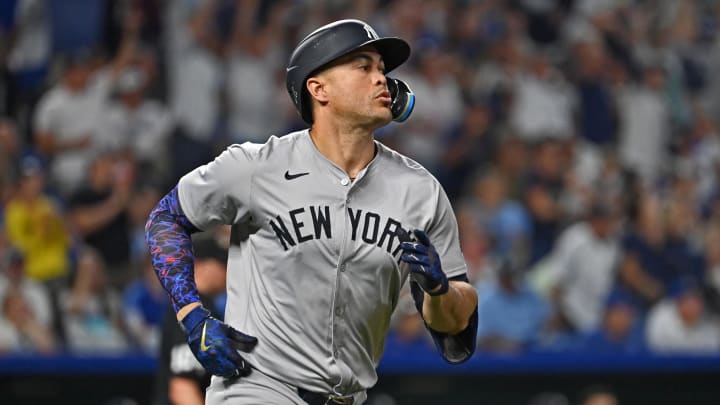Jun 11, 2024; Kansas City, Missouri, USA; New York Yankees designated hitter Giancarlo Stanton (27) runs the bases after hitting a solo home run in the seventh inning against the Kansas City Royals at Kauffman Stadium. Mandatory Credit: Peter Aiken-USA TODAY Sports Jun 11, 2024; Kansas City, Missouri, USA; New York Yankees designated hitter Giancarlo Stanton (27) runs the bases after hitting a solo home run in the seventh inning against the Kansas City Royals at Kauffman Stadium. Mandatory Credit: Peter Aiken-USA TODAY Sports