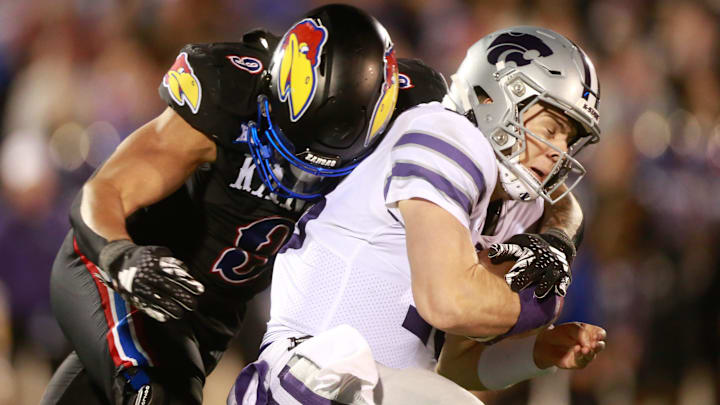 Kansas State's Austin Booker moves in for a sack against Kansas. 