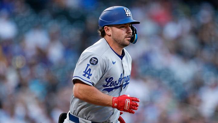 Aug 19, 2025; Denver, Colorado, USA; Los Angeles Dodgers third baseman Buddy Kennedy (46) runs to first on an RBI single advancing to second in the third inning against the Colorado Rockies at Coors Field. Mandatory Credit: Isaiah J. Downing-Imagn Images Aug 19, 2025; Denver, Colorado, USA; Los Angeles Dodgers third baseman Buddy Kennedy (46) runs to first on an RBI single advancing to second in the third inning against the Colorado Rockies at Coors Field. Mandatory Credit: Isaiah J. Downing-Imagn Images