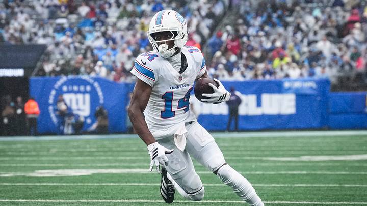 Tennessee Titans wide receiver Carnell Tate (14) runs with the ball during a game against the New York Giants at MetLife Stadium, Sep 27, 2026, East Rutherford, NJ, USA.
