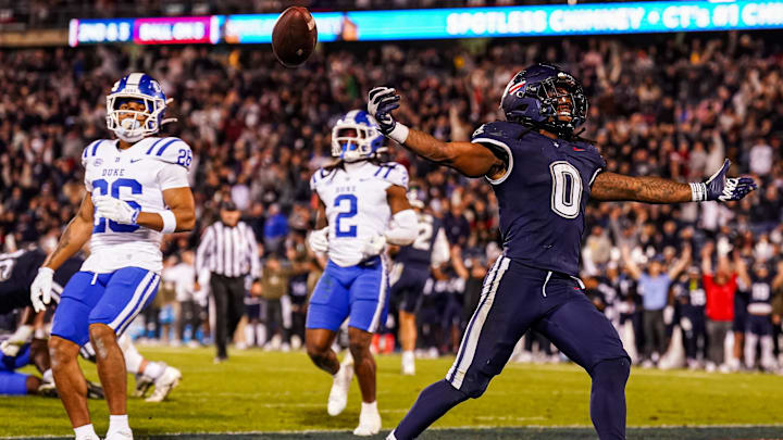 Nov 8, 2025; East Hartford, Connecticut, USA; UConn Huskies running back Cam Edwards (0) scores against the Duke Blue Devils in the second half at Pratt & Whitney Stadium at Rentschler Field. Mandatory Credit: David Butler II-Imagn Images