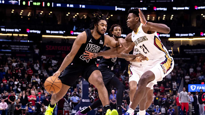 Nov 11, 2024; New Orleans, Louisiana, USA; Brooklyn Nets guard Cam Thomas (24) dribbles against New Orleans Pelicans center Yves Missi (21) during the first half at Smoothie King Center. Mandatory Credit: Stephen Lew-Imagn Images