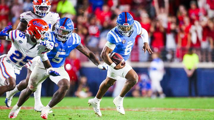 Nov 15, 2025; Oxford, Mississippi, USA; Mississippi Rebels quarterback Trinidad Chambliss (6) rushes against the Florida Gators during the third quarter at Vaught-Hemingway Stadium. Mandatory Credit: Petre Thomas-Imagn Images Nov 15, 2025; Oxford, Mississippi, USA; Mississippi Rebels quarterback Trinidad Chambliss (6) rushes against the Florida Gators during the third quarter at Vaught-Hemingway Stadium. Mandatory Credit: Petre Thomas-Imagn Images