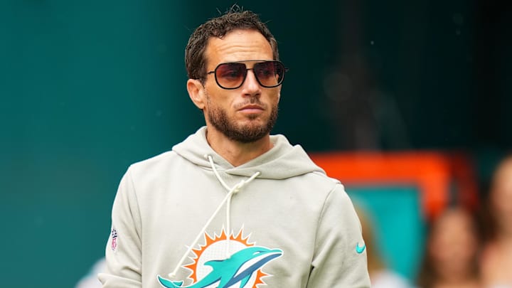 Nov 30, 2025; Miami Gardens, Florida, USA; Miami Dolphins head coach Mike McDaniel stands on the field prior to a game against the New Orleans Saints at Hard Rock Stadium. Mandatory Credit: Rich Storry-Imagn Images