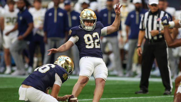 Oct 19, 2024; Atlanta, Georgia, USA; Notre Dame Fighting Irish place kicker Zac Yoakam (92) kicks a field goal against the Georgia Tech Yellow Jackets in the fourth quarter at Mercedes-Benz Stadium.
