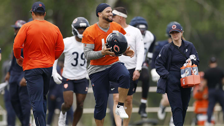 Jun 3, 2025; Lake Forest, IL, USA; Chicago Bears quarterback Caleb Williams (18) warms up during minicamp at Halas Hall. Mandatory Credit: Kamil Krzaczynski-Imagn Images