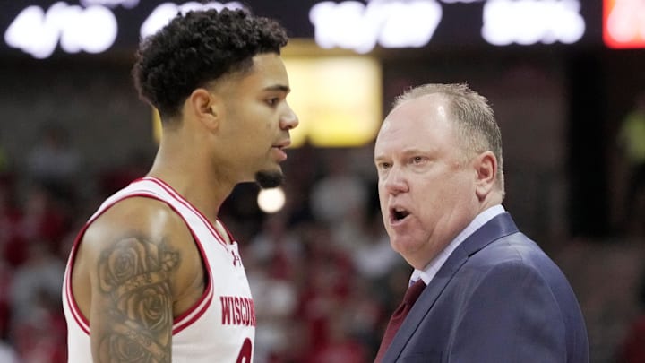 Wisconsin head coach Greg Gard talks with guard Nick Boyd (2) during the first half of their game against Campbell Monday, November 3, 2025 at the Kohl Center in Madison, Wisconsin. Wisconsin head coach Greg Gard talks with guard Nick Boyd (2) during the first half of their game against Campbell Monday, November 3, 2025 at the Kohl Center in Madison, Wisconsin.