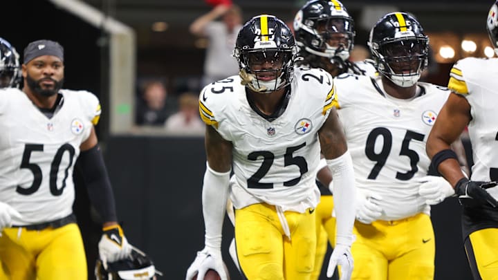 Sep 8, 2024; Atlanta, Georgia, USA; Pittsburgh Steelers safety DeShon Elliott (25) celebrates with teammates after an interception against the Atlanta Falcons in the first quarter at Mercedes-Benz Stadium. Mandatory Credit: Brett Davis-Imagn Images