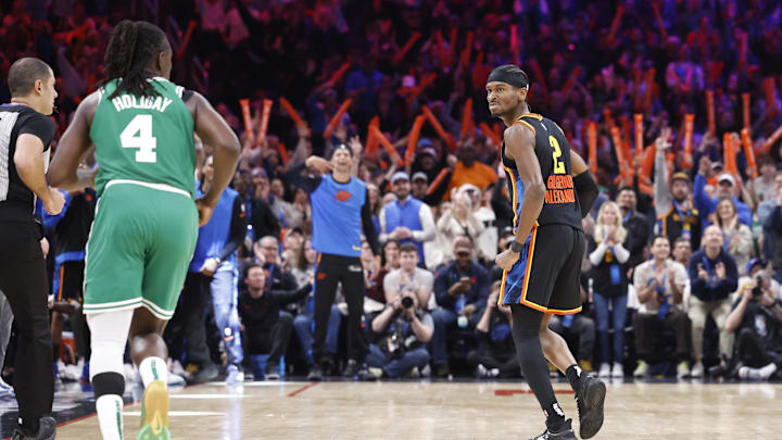 Jan 5, 2025; Oklahoma City, Oklahoma, USA; Oklahoma City Thunder guard Shai Gilgeous-Alexander (2) reacts after scoring against the Boston Celtics during the fourth quarter at Paycom Center. Mandatory Credit: Alonzo Adams-Imagn Images