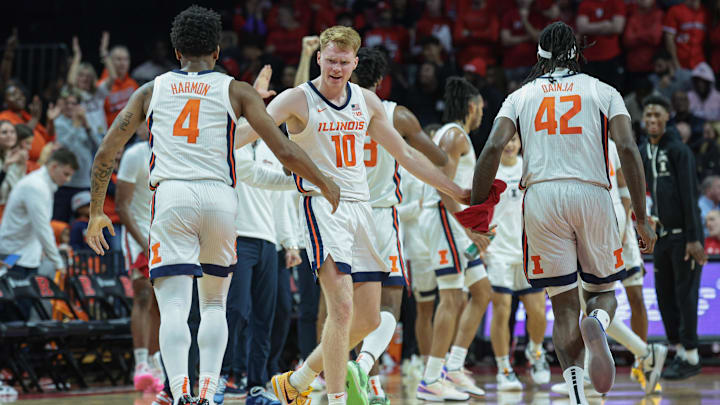 Dec 2, 2023; Piscataway, New Jersey, USA; Illinois Fighting Illini guard Luke Goode (10) celebrates