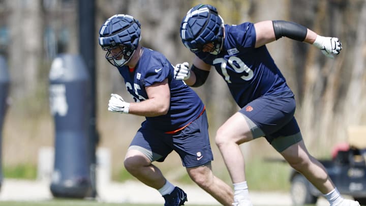 May 9, 2025; Lake Forest, IL, USA; Chicago Bears offensive line Luke Newman (65) and Theo Benedet (79) run during the Rookie Minicamp at Halas Hall. Mandatory Credit: Kamil Krzaczynski-Imagn Images
