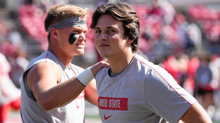 Oct 5, 2024; Columbus, OH, USA; Ohio State Buckeyes quarterback Julian Sayin and quarterback Lincoln Kienholz warm up prior to the NCAA football game against the Iowa Hawkeyes at Ohio Stadium.