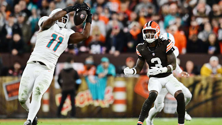 Cleveland Browns wide receiver Jerry Jeudy (3) watches as Miami Dolphins linebacker Tyrel Dodson (11) intercepts the pass during the first half at Huntington Bank Field. 