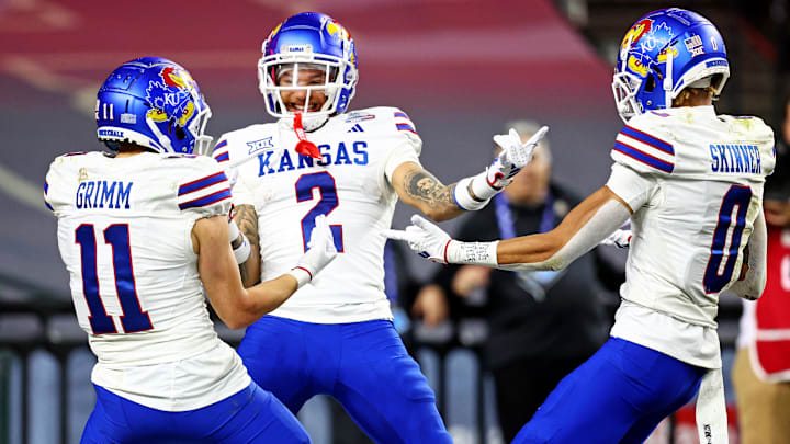Dec 26, 2023; Phoenix, AZ, USA; Kansas Jayhawks wide receiver Lawrence Arnold (2) celebrates with