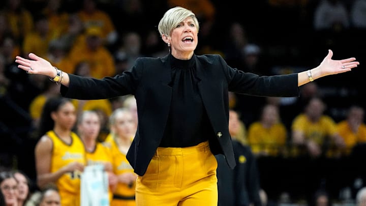 Iowa Hawkeyes head coach Jan Jensen reacts as a technical foul is called against Iowa Hawkeyes guard Sydney Affolter (3) while playing the Indiana Hoosiers Sunday, Jan. 12, 2025 at Carver-Hawkeye Arena in Iowa City, Iowa.