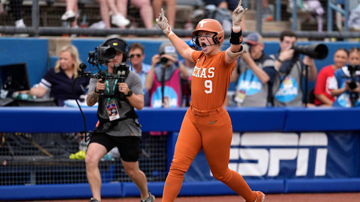 Texas infielder Joley Mitchell (9) celebrates after hitting a home run in the second inning of a Women's College World Series softball game between the Texas Longhorns and the Florida Gators at Devon Park in Oklahoma City, Thursday, May 29, 2025. Texas infielder Joley Mitchell (9) celebrates after hitting a home run in the second inning of a Women's College World Series softball game between the Texas Longhorns and the Florida Gators at Devon Park in Oklahoma City, Thursday, May 29, 2025.