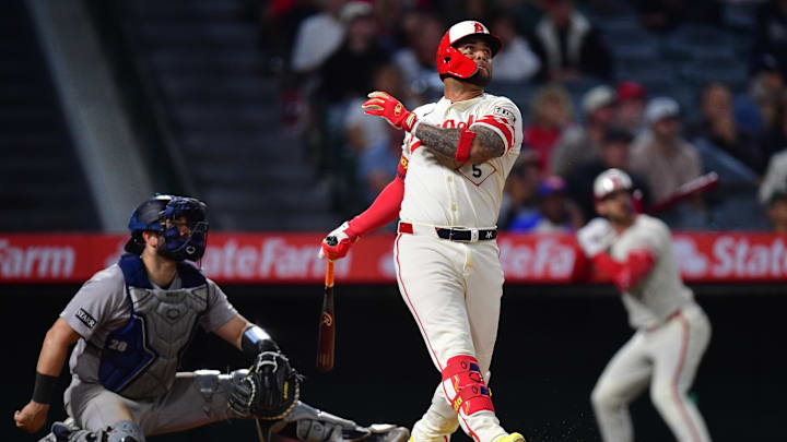 May 27, 2025; Anaheim, California, USA; Los Angeles Angels third baseman Yoan Moncada (5) hits a solo home run against the New York Yankees during the ninth inning at Angel Stadium. Mandatory Credit: Gary A. Vasquez-Imagn Images