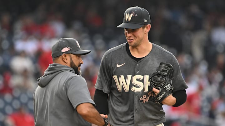 Sep 29, 2024; Washington, District of Columbia, USA; Washington Nationals starting pitcher Jackson Rutledge (79) shakes hands with manager Dave Martinez (4) after getting pulled from the game against the Philadelphia Phillies during the seventh inning at Nationals Park. Mandatory Credit: Rafael Suanes-Imagn Images Sep 29, 2024; Washington, District of Columbia, USA; Washington Nationals starting pitcher Jackson Rutledge (79) shakes hands with manager Dave Martinez (4) after getting pulled from the game against the Philadelphia Phillies during the seventh inning at Nationals Park. Mandatory Credit: Rafael Suanes-Imagn Images