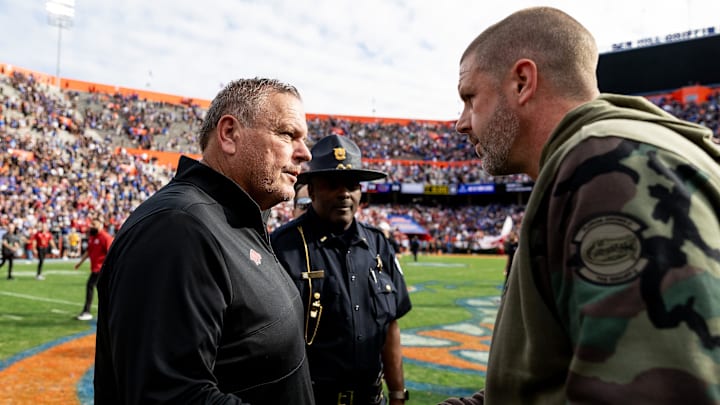 Arkansas Razorbacks coach Sam Pittman and Florida Gators coach Billy Napier shake hands after the game at Steve Spurrier Field at Ben Hill Griffin Stadium in Gainesville, FL on Saturday, November 4, 2023.