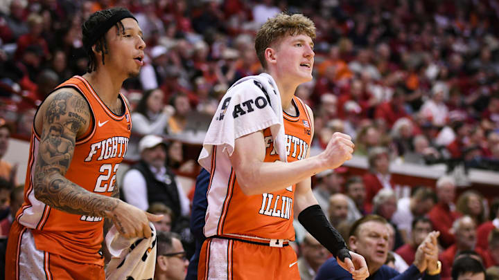 Jan 14, 2025; Bloomington, Indiana, USA; Illinois Fighting Illini guard Tre White (22) and Illinois Fighting Illini guard Kasparas Jakucionis (32) cheer from the bench during the second half against the Indiana Hoosiers at Simon Skjodt Assembly Hall. Mandatory Credit: Robert Goddin-Imagn Images Jan 14, 2025; Bloomington, Indiana, USA; Illinois Fighting Illini guard Tre White (22) and Illinois Fighting Illini guard Kasparas Jakucionis (32) cheer from the bench during the second half against the Indiana Hoosiers at Simon Skjodt Assembly Hall. Mandatory Credit: Robert Goddin-Imagn Images