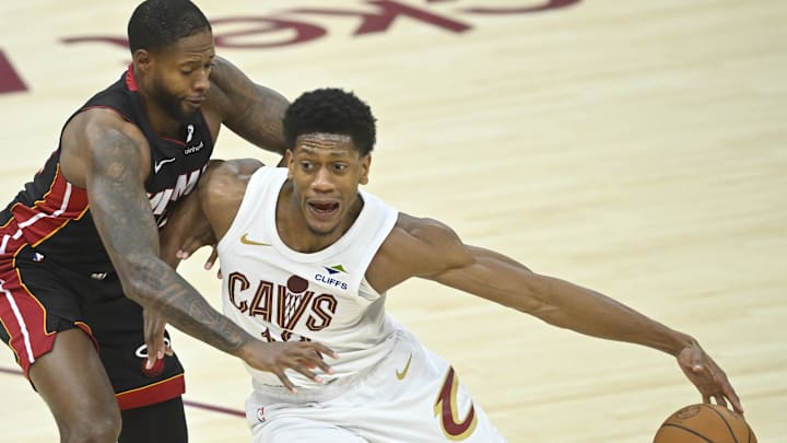 Apr 23, 2025; Cleveland, Ohio, USA; Miami Heat forward Haywood Highsmith (24) defends Cleveland Cavaliers forward De'Andre Hunter (12) in the third quarter of game two of the first round of the 2025 NBA Playoffs at Rocket Arena. Mandatory Credit: David Richard-Imagn Images Apr 23, 2025; Cleveland, Ohio, USA; Miami Heat forward Haywood Highsmith (24) defends Cleveland Cavaliers forward De'Andre Hunter (12) in the third quarter of game two of the first round of the 2025 NBA Playoffs at Rocket Arena. Mandatory Credit: David Richard-Imagn Images