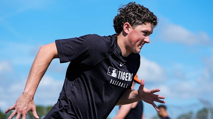 Detroit Tigers pitcher Reese Olson sprints after practice during spring training at TigerTown in Lakeland, Fla. on Saturday, Feb. 15, 2025.