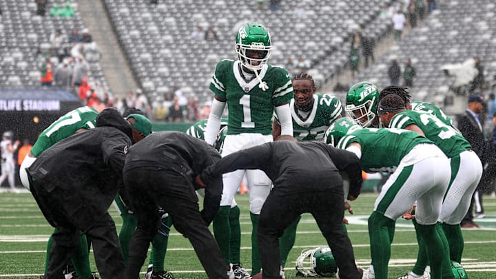 Sep 29, 2024; East Rutherford, New Jersey, USA; New York Jets cornerback Sauce Gardner (1) huddle with teammates before the game against the Denver Broncos at MetLife Stadium. Mandatory Credit: Vincent Carchietta-Imagn Images