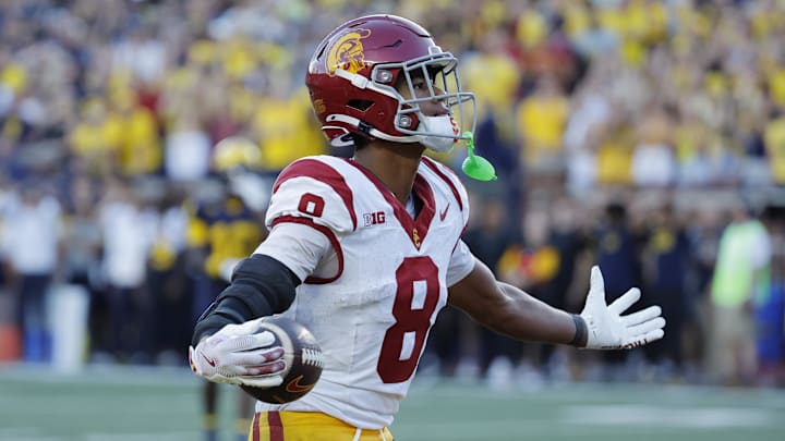 Sep 21, 2024; Ann Arbor, Michigan, USA; USC Trojans wide receiver Ja'Kobi Lane (8) celebrates a touchdown in the second half against the Michigan Wolverines at Michigan Stadium. Mandatory Credit: Rick Osentoski-Imagn Images Sep 21, 2024; Ann Arbor, Michigan, USA; USC Trojans wide receiver Ja'Kobi Lane (8) celebrates a touchdown in the second half against the Michigan Wolverines at Michigan Stadium. Mandatory Credit: Rick Osentoski-Imagn Images