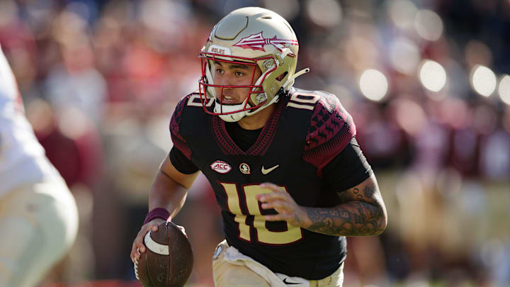 Florida State Seminoles quarterback AJ Duffy (10) runs the ball down the field. The Florida State Seminoles hosted their annual Garnet and Gold spring game at Doak Campbell Stadium on Saturday, April 9, 2022.

Fsu Spring Game279