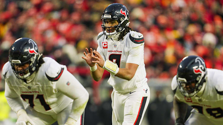 Jan 18, 2025; Kansas City, Missouri, USA; Houston Texans quarterback C.J. Stroud (7) gets ready before the snap during the second half against the Kansas City Chiefs in a 2025 AFC divisional round game at GEHA Field at Arrowhead Stadium. Mandatory Credit: Jay Biggerstaff-Imagn Images