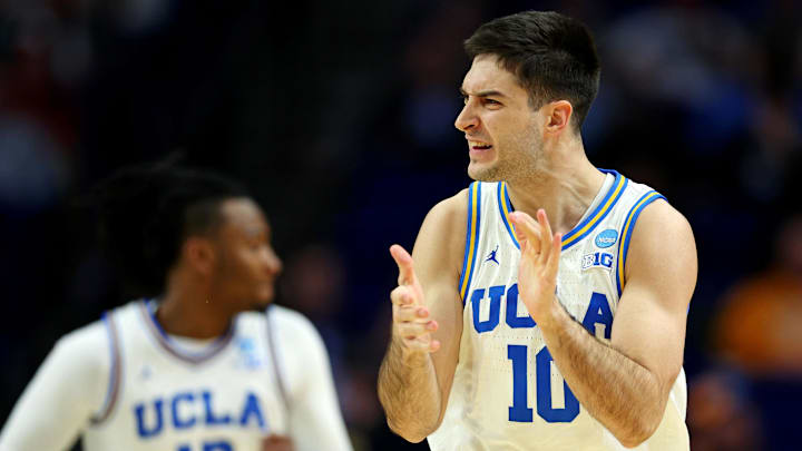 Mar 20, 2025; Lexington, KY, USA;  UCLA Bruins guard Lazar Stefanovic (10) celebrates after a play during the first half against the Utah State Aggies in the first round of the NCAA Tournament at Rupp Arena. Mandatory Credit: Jordan Prather-Imagn Images