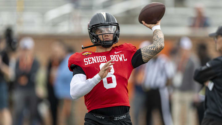 Jan 30, 2025; Mobile, AL, USA; National team quarterback Dillon Gabriel of Oregon (8) works through drills during Senior Bowl practice for the National team at Hancock Whitney Stadium. Mandatory Credit: Vasha Hunt-Imagn Images