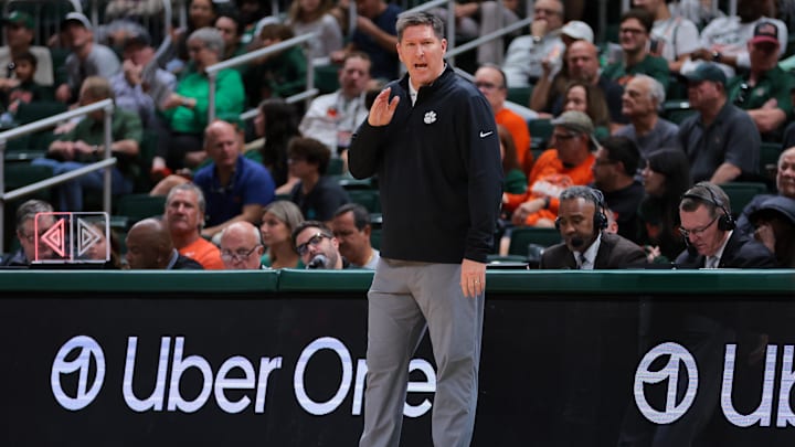 Dec 7, 2024; Coral Gables, Florida, USA; Clemson Tigers head coach Brad Brownell watches from the sideline against the Miami Hurricanes during the first half at Watsco Center. Dec 7, 2024; Coral Gables, Florida, USA; Clemson Tigers head coach Brad Brownell watches from the sideline against the Miami Hurricanes during the first half at Watsco Center.