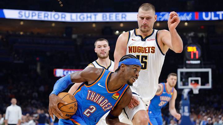 Oct 22, 2026; Oklahoma City, Oklahoma, USA; Oklahoma City Thunder guard Shai Gilgeous-Alexander (2) moves around Denver Nuggets center Nikola Jokic (15) during the first half at Paycom Center. Mandatory Credit: Alonzo Adams-Imagn Images Oct 22, 2026; Oklahoma City, Oklahoma, USA; Oklahoma City Thunder guard Shai Gilgeous-Alexander (2) moves around Denver Nuggets center Nikola Jokic (15) during the first half at Paycom Center. Mandatory Credit: Alonzo Adams-Imagn Images
