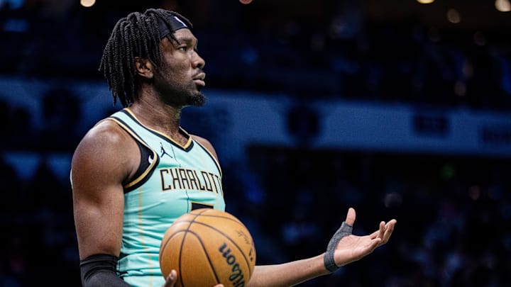 Jan 24, 2025; Charlotte, North Carolina, USA; Charlotte Hornets center Mark Williams (5) reacts after a foul against the Portland Trail Blazers during the third quarter at Spectrum Center.