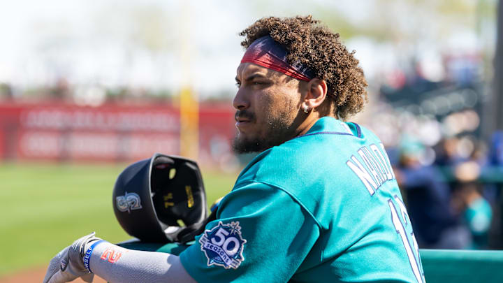 Feb 25, 2026; Surprise, Arizona, USA; Seattle Mariners infielder Josh Naylor against the Kansas City Royals during a spring training game at Surprise Stadium. Mandatory Credit: Mark J. Rebilas-Imagn Images Feb 25, 2026; Surprise, Arizona, USA; Seattle Mariners infielder Josh Naylor against the Kansas City Royals during a spring training game at Surprise Stadium. Mandatory Credit: Mark J. Rebilas-Imagn Images
