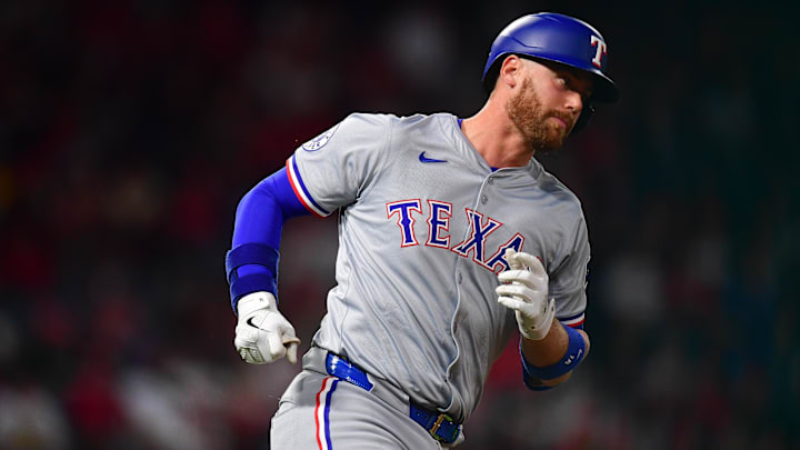 Sep 27, 2024; Anaheim, California, USA; Texas Rangers designated hitter Carson Kelly (18) runs the bases after hitting a solo home run against the Los Angeles Angels during the fourth inning at Angel Stadium