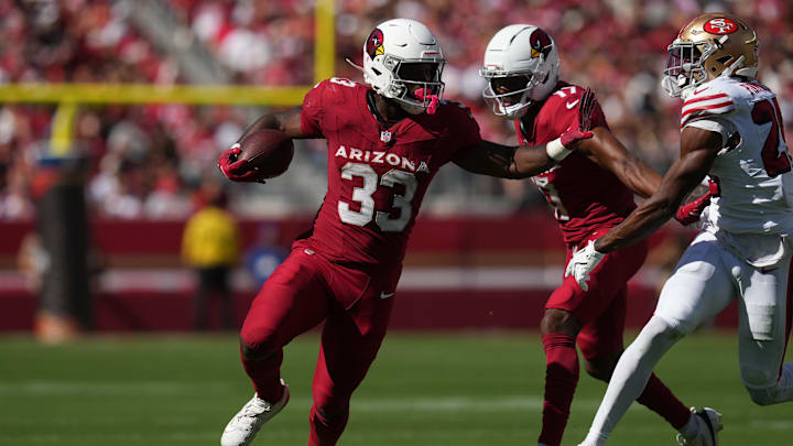 Sep 21, 2025; Santa Clara, California, USA; Arizona Cardinals running back Trey Benson (33) carries the ball as San Francisco 49ers safety Jason Pinnock (25) defends during the second half at Levi's Stadium. Mandatory Credit: Cary Edmondson-Imagn Images Sep 21, 2025; Santa Clara, California, USA; Arizona Cardinals running back Trey Benson (33) carries the ball as San Francisco 49ers safety Jason Pinnock (25) defends during the second half at Levi's Stadium. Mandatory Credit: Cary Edmondson-Imagn Images